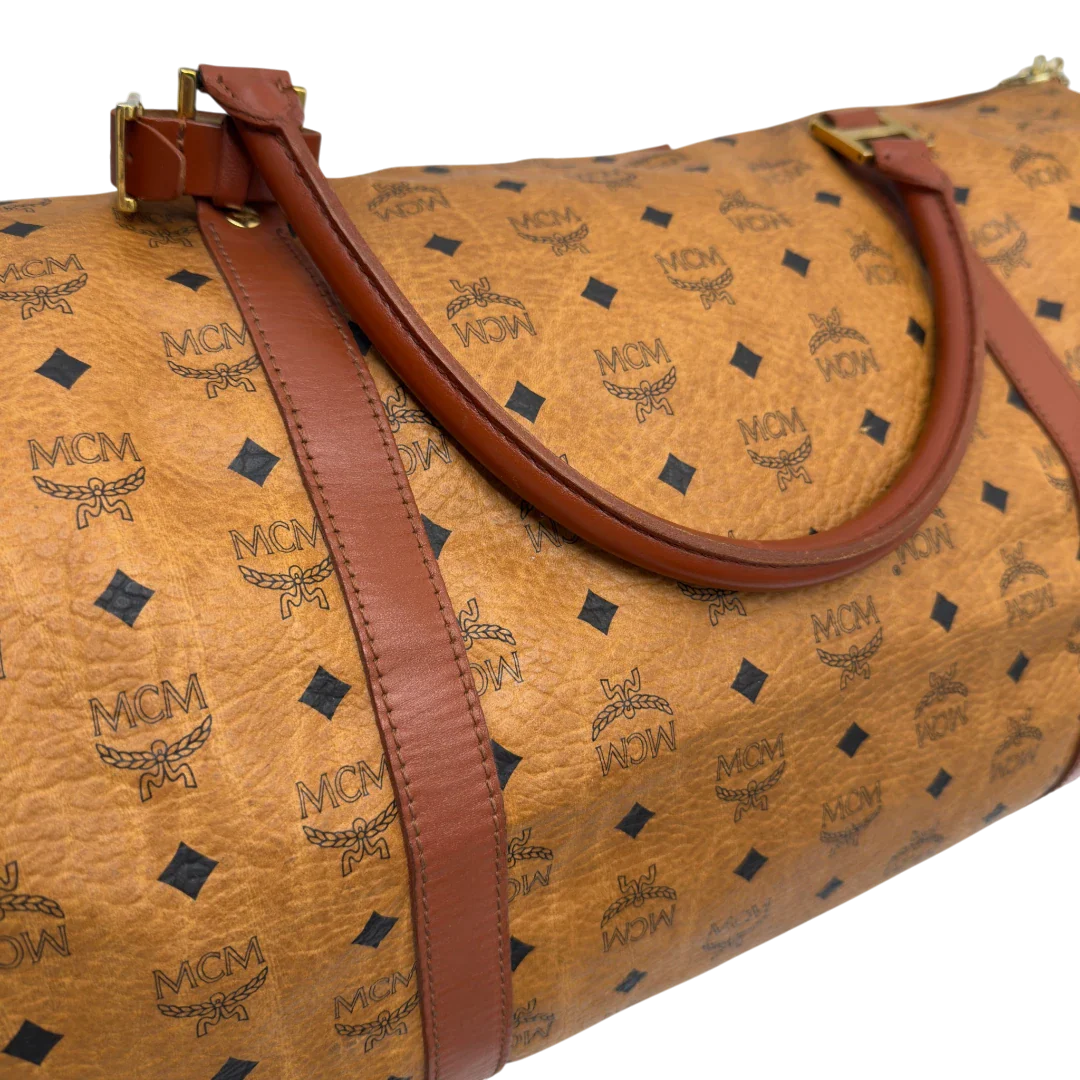 https://cdn.shopify.com/s/files/1/0564/9376/8855/files/MCMReisetascheGross5642.webp?v=1777464229