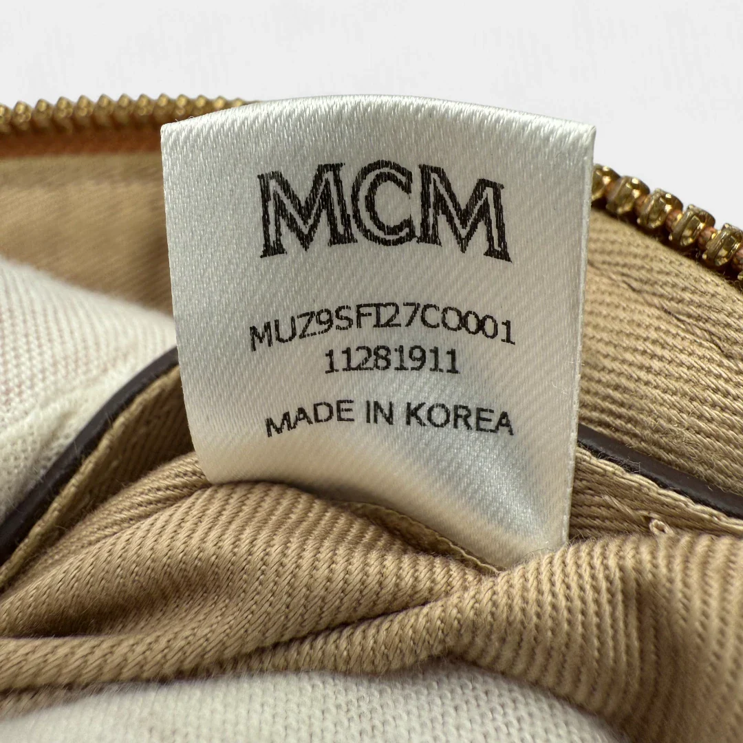 https://cdn.shopify.com/s/files/1/0564/9376/8855/files/MCM_Bauchtasche_Fursten_small_visetos_braun_second_hand_luxury_MCM_Fannypack7840.webp?v=1756983959