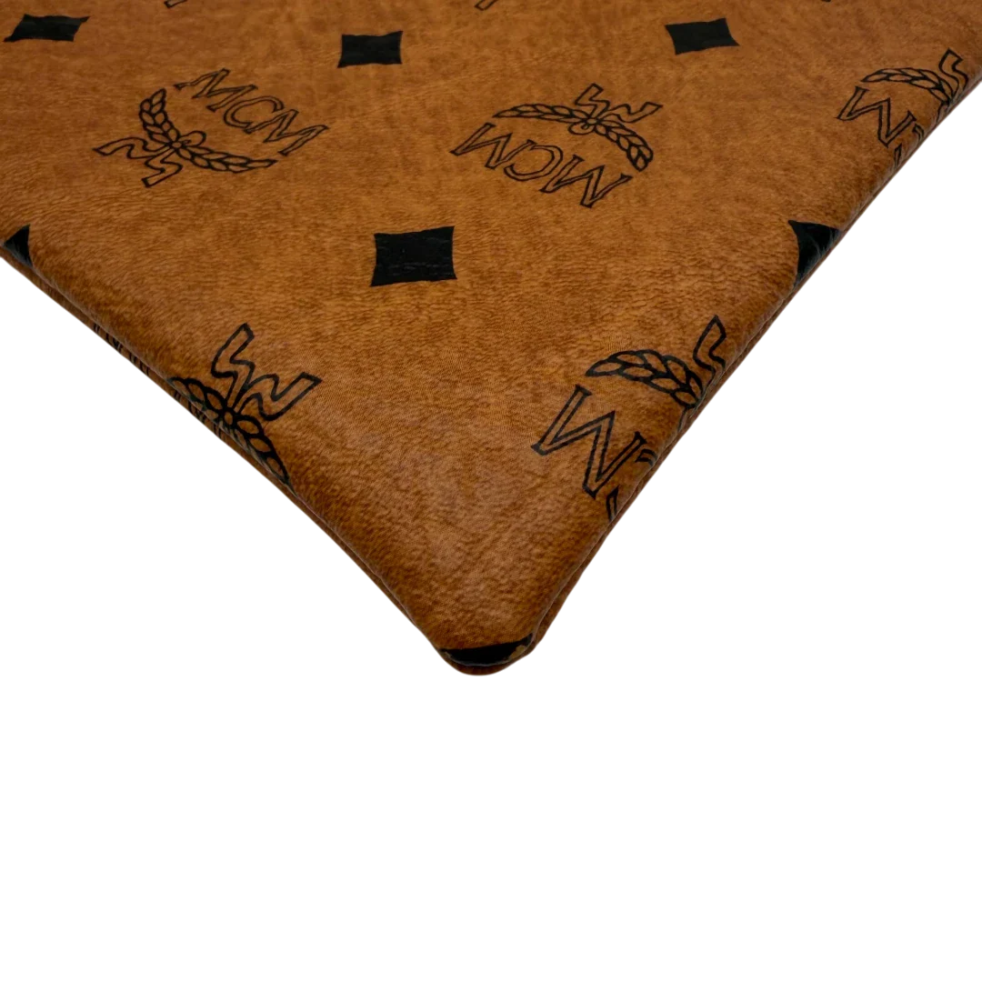 https://cdn.shopify.com/s/files/1/0564/9376/8855/files/MCM_Clutch_klein_vintage5561.webp?v=1777484967