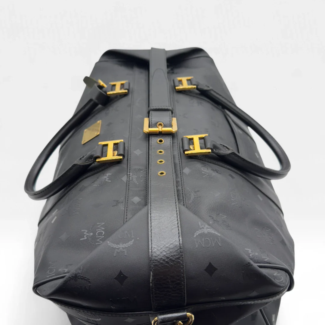 https://cdn.shopify.com/s/files/1/0564/9376/8855/files/MCM_Dufflebag5184.webp?v=1754669422
