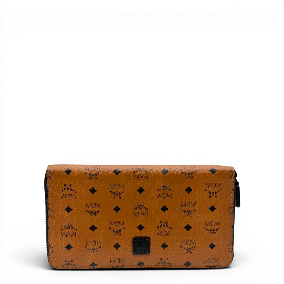 https://cdn.shopify.com/s/files/1/0564/9376/8855/files/MCM_Geldbeutel_Aren_Zip_Around_visetos_braun_1.webp?v=1781856085
