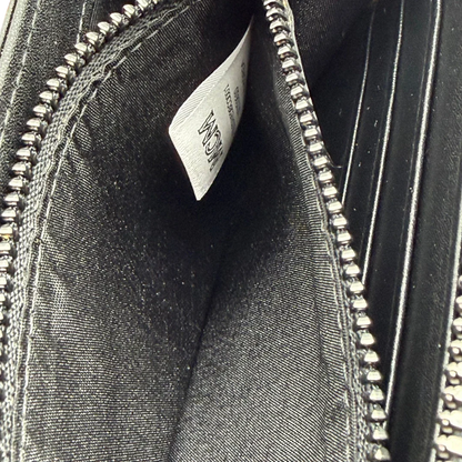 https://cdn.shopify.com/s/files/1/0564/9376/8855/files/MCM_Geldbeutel_Aren_Zip_Around_visetos_braun_13.webp?v=1781856086