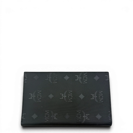 https://cdn.shopify.com/s/files/1/0564/9376/8855/files/MCM_Geldbeutel_Visetos_schwarz_vintage5539.webp?v=1777481520