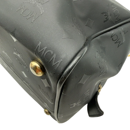 https://cdn.shopify.com/s/files/1/0564/9376/8855/files/MCM_Handtasche_Boston_35_vintage_mit_Umhangegurt_aus_PVC_schwarz_vintage7918.webp?v=1779969406
