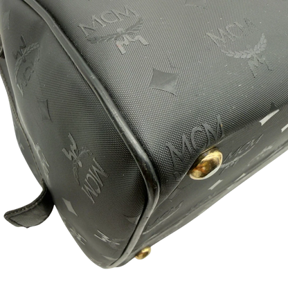 https://cdn.shopify.com/s/files/1/0564/9376/8855/files/MCM_Handtasche_Boston_35_vintage_mit_Umhangegurt_aus_PVC_schwarz_vintage7919.webp?v=1779969406