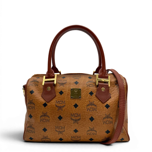 https://cdn.shopify.com/s/files/1/0564/9376/8855/files/MCM_Handtasche_Boston_vintage_mit_Umhangegurt_visetos_braun_vintage6378.webp?v=1778674043