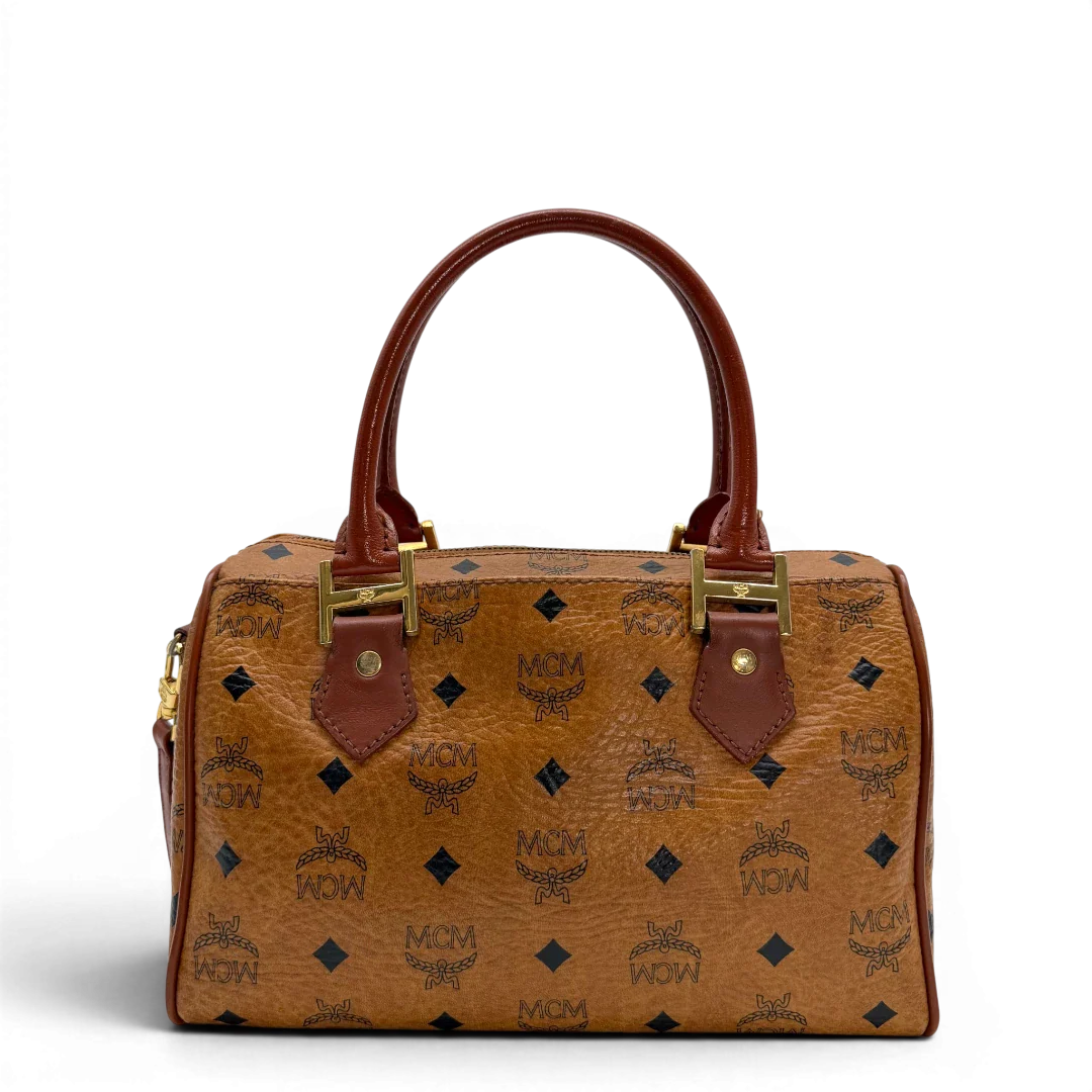 https://cdn.shopify.com/s/files/1/0564/9376/8855/files/MCM_Handtasche_Boston_vintage_mit_Umhangegurt_visetos_braun_vintage6380.webp?v=1778674043