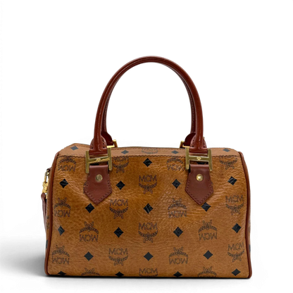 https://cdn.shopify.com/s/files/1/0564/9376/8855/files/MCM_Handtasche_Boston_vintage_mit_Umhangegurt_visetos_braun_vintage6380.webp?v=1778674043