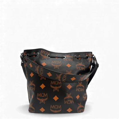 https://cdn.shopify.com/s/files/1/0564/9376/8855/files/MCM_Handtasche_Bucket_Dessau_Maxi_visetos_schwarz___orange_vintage_handbag2975.webp?v=1764858045