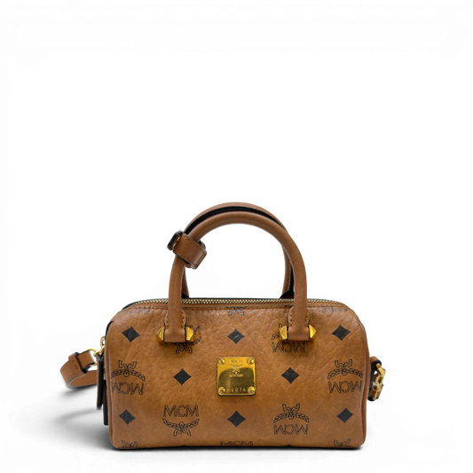 https://cdn.shopify.com/s/files/1/0564/9376/8855/files/MCM_Handtasche_Mini_Boston_mit_Umhangegurt_visetos_braun_1.webp?v=1783514276