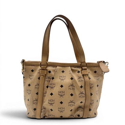https://cdn.shopify.com/s/files/1/0564/9376/8855/files/MCM_Handtasche_mit_Umhangegurt_visetos_beige_7.webp?v=1784795876