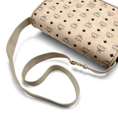 https://cdn.shopify.com/s/files/1/0564/9376/8855/files/MCM_Messenger_Tasche_Aren_in_Visetos_beige_vintage_bag4463.webp?v=1764858166