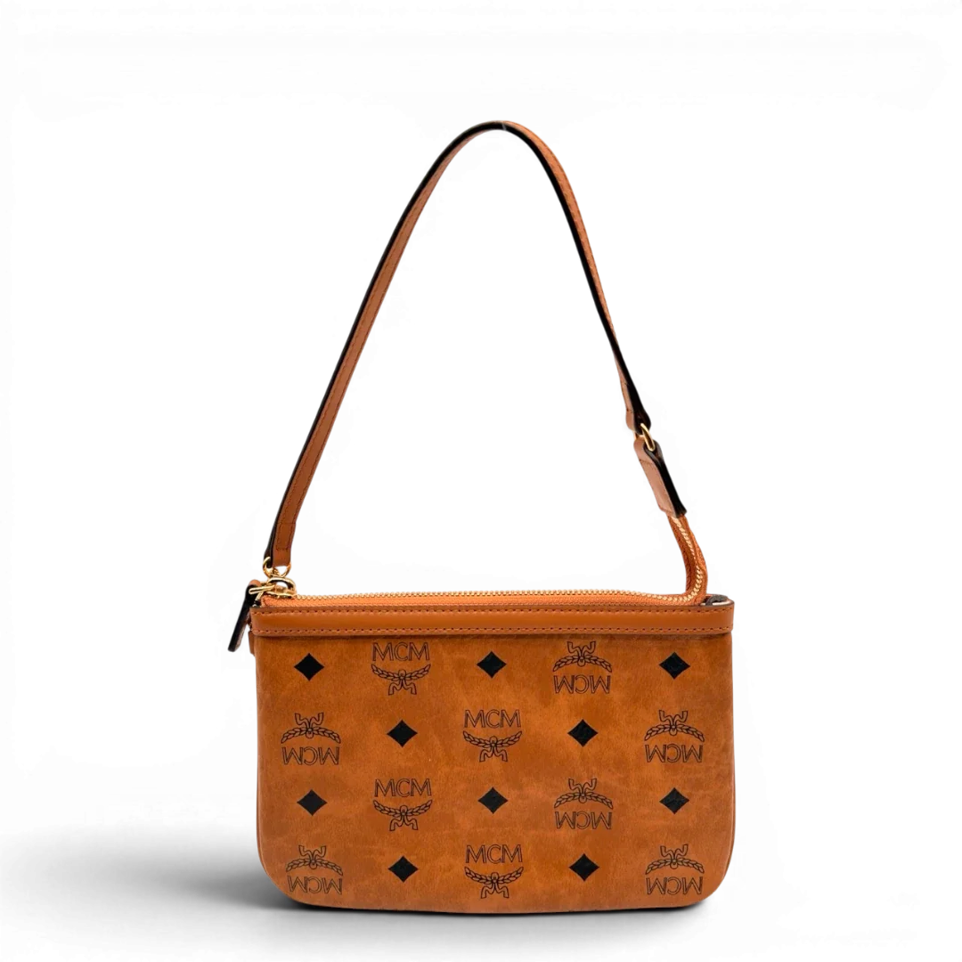 https://cdn.shopify.com/s/files/1/0564/9376/8855/files/MCM_Pochette_small_visetos_braun_1.webp?v=1784804535