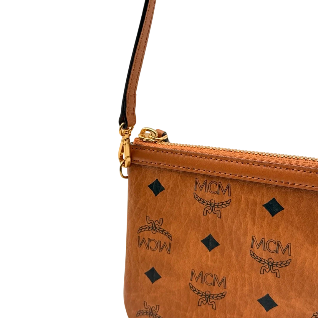 https://cdn.shopify.com/s/files/1/0564/9376/8855/files/MCM_Pochette_small_visetos_braun_12.webp?v=1784804533