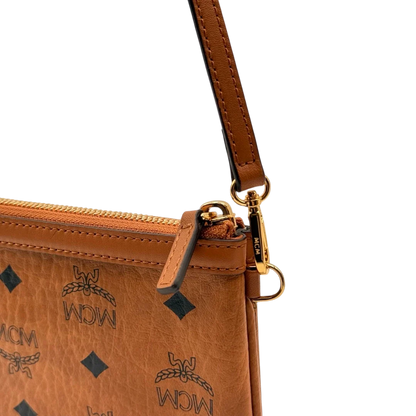 https://cdn.shopify.com/s/files/1/0564/9376/8855/files/MCM_Pochette_small_visetos_braun_13.webp?v=1784804534
