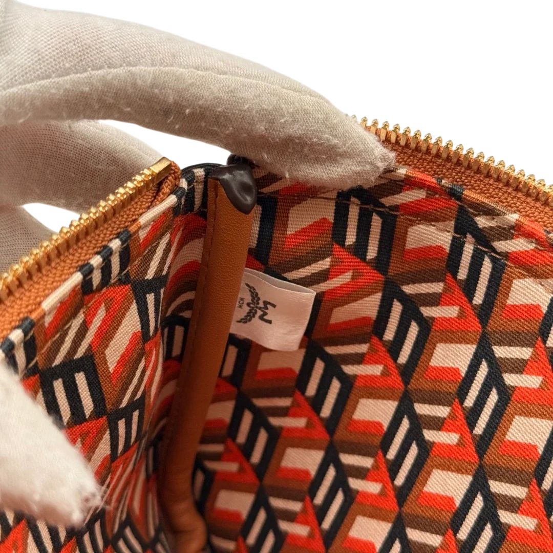https://cdn.shopify.com/s/files/1/0564/9376/8855/files/MCM_Pochette_small_visetos_braun_17.webp?v=1784804534