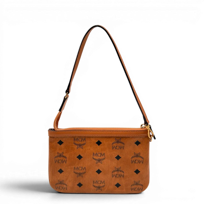 https://cdn.shopify.com/s/files/1/0564/9376/8855/files/MCM_Pochette_small_visetos_braun_2.webp?v=1784804534