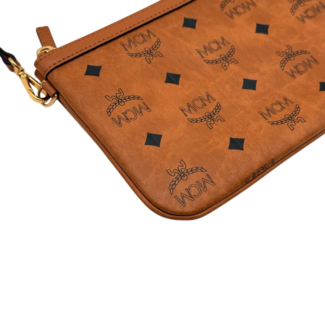 https://cdn.shopify.com/s/files/1/0564/9376/8855/files/MCM_Pochette_small_visetos_braun_9.webp?v=1784804534