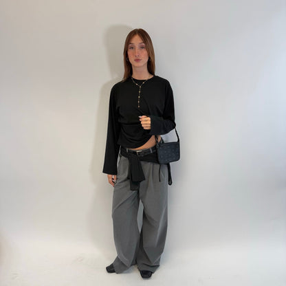 https://cdn.shopify.com/s/files/1/0564/9376/8855/files/MCM_Pochette_small_visetos_schwarz_1.jpg?v=1784801019