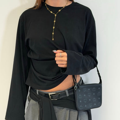 https://cdn.shopify.com/s/files/1/0564/9376/8855/files/MCM_Pochette_small_visetos_schwarz_2.jpg?v=1784801020