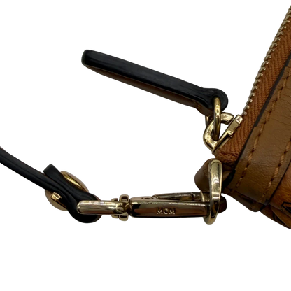 https://cdn.shopify.com/s/files/1/0564/9376/8855/files/MCM_Pochette_visetos_braun_11.webp?v=1781855350