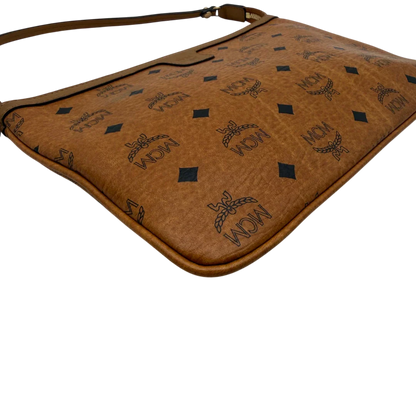 https://cdn.shopify.com/s/files/1/0564/9376/8855/files/MCM_Pochette_visetos_braun_6.webp?v=1781855350
