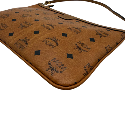 https://cdn.shopify.com/s/files/1/0564/9376/8855/files/MCM_Pochette_visetos_braun_7.webp?v=1781855350