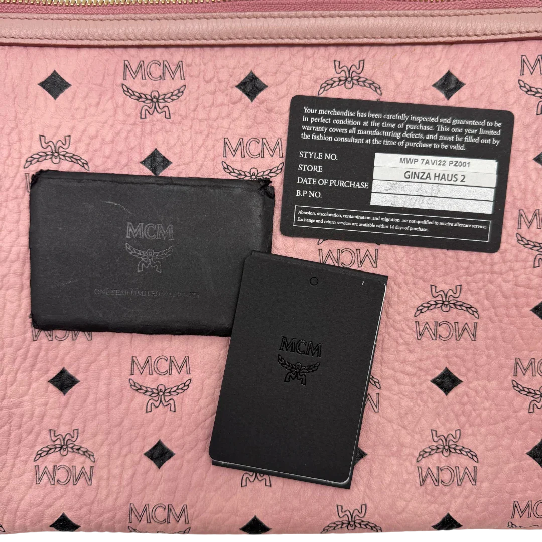 https://cdn.shopify.com/s/files/1/0564/9376/8855/files/MCM_Pochette_visetos_rosa_vintage1317.webp?v=1778833130