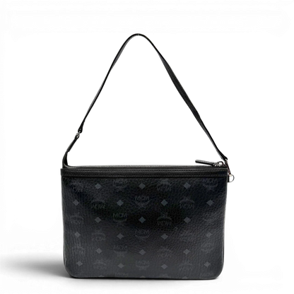 https://cdn.shopify.com/s/files/1/0564/9376/8855/files/MCM_Pochette_visetos_schwarz_1.webp?v=1781855869