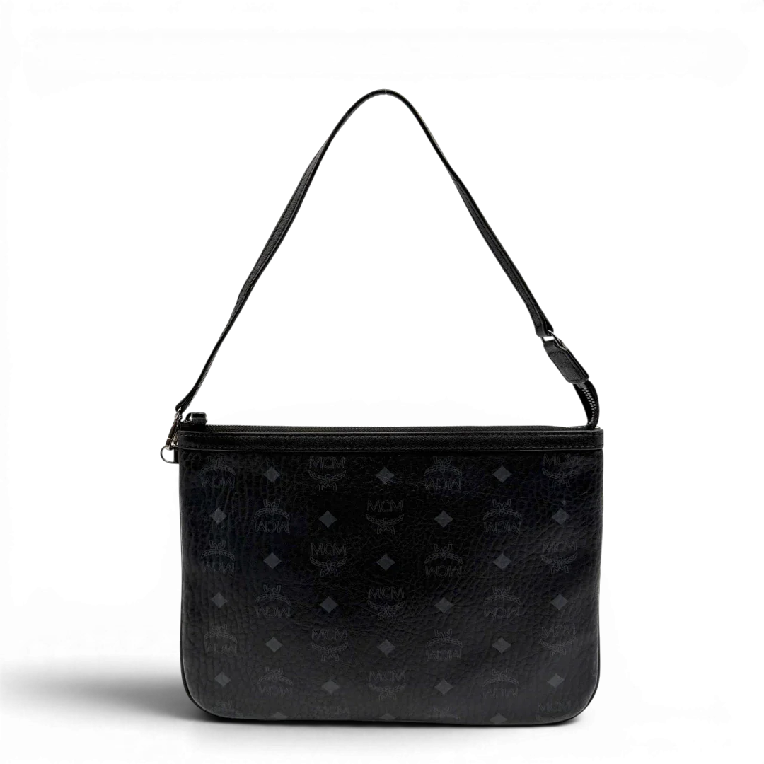 https://cdn.shopify.com/s/files/1/0564/9376/8855/files/MCM_Pochette_visetos_schwarz_2.webp?v=1781855869