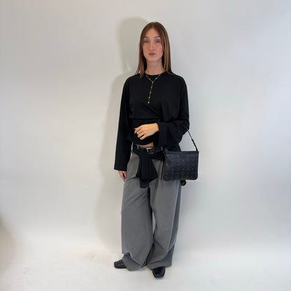 https://cdn.shopify.com/s/files/1/0564/9376/8855/files/MCM_Pochette_visetos_schwarz_21.jpg?v=1784804648