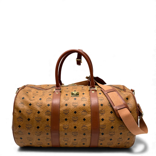https://cdn.shopify.com/s/files/1/0564/9376/8855/files/MCM_Reisetasche_50_Zylinderform_visetos_braun_vintage_dufflebag4037.webp?v=1764296229