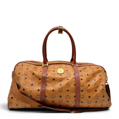 https://cdn.shopify.com/s/files/1/0564/9376/8855/files/MCM_Reisetasche_55_vintage_mit_Schultergurt_visetos_braun_1.webp?v=1784125618