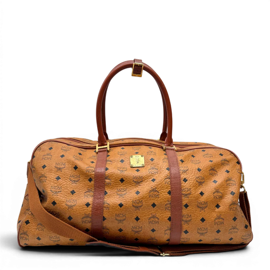 https://cdn.shopify.com/s/files/1/0564/9376/8855/files/MCM_Reisetasche_55_vintage_mit_Schultergurt_visetos_braun_1.webp?v=1784125618