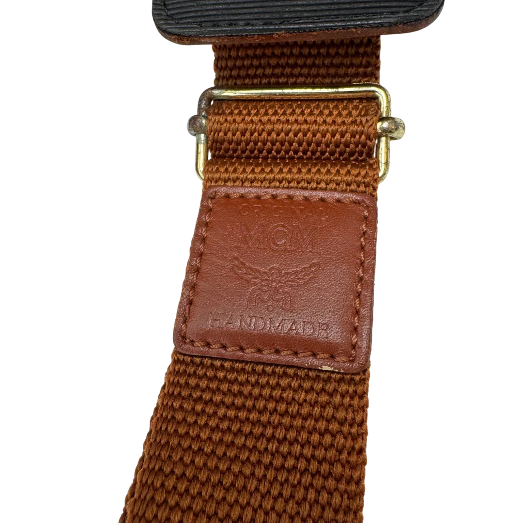 https://cdn.shopify.com/s/files/1/0564/9376/8855/files/MCM_Reisetasche_55_vintage_mit_Schultergurt_visetos_braun_14.webp?v=1784125617