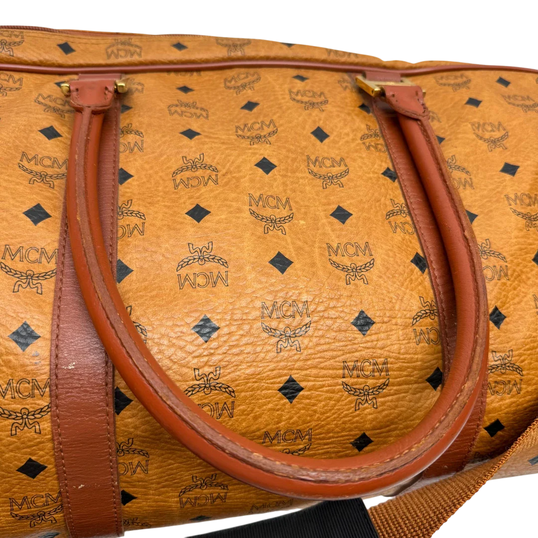 https://cdn.shopify.com/s/files/1/0564/9376/8855/files/MCM_Reisetasche_55_vintage_mit_Schultergurt_visetos_braun_17.webp?v=1784125617