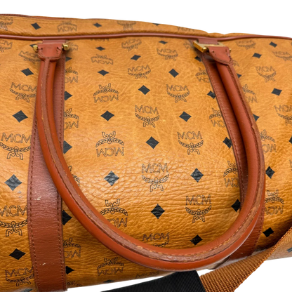 https://cdn.shopify.com/s/files/1/0564/9376/8855/files/MCM_Reisetasche_55_vintage_mit_Schultergurt_visetos_braun_17.webp?v=1784125617