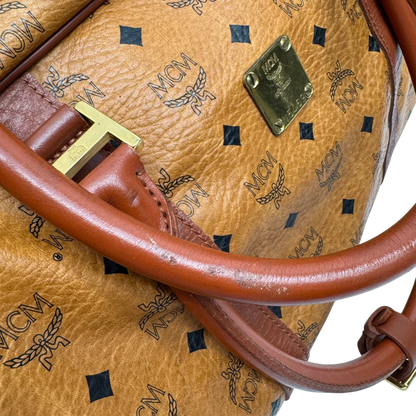 https://cdn.shopify.com/s/files/1/0564/9376/8855/files/MCM_Reisetasche_55_vintage_mit_Schultergurt_visetos_braun_20.webp?v=1784125617