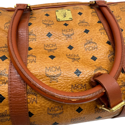 https://cdn.shopify.com/s/files/1/0564/9376/8855/files/MCM_Reisetasche_55_vintage_mit_Schultergurt_visetos_braun_21.webp?v=1784125617