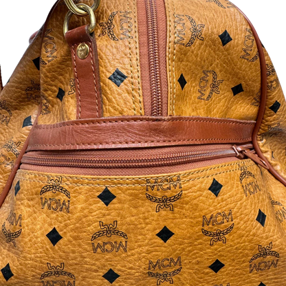 https://cdn.shopify.com/s/files/1/0564/9376/8855/files/MCM_Reisetasche_55_vintage_mit_Schultergurt_visetos_braun_23.webp?v=1784125617