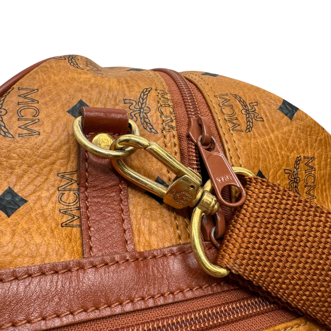 https://cdn.shopify.com/s/files/1/0564/9376/8855/files/MCM_Reisetasche_55_vintage_mit_Schultergurt_visetos_braun_24.webp?v=1784125617