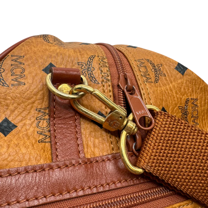 https://cdn.shopify.com/s/files/1/0564/9376/8855/files/MCM_Reisetasche_55_vintage_mit_Schultergurt_visetos_braun_24.webp?v=1784125617
