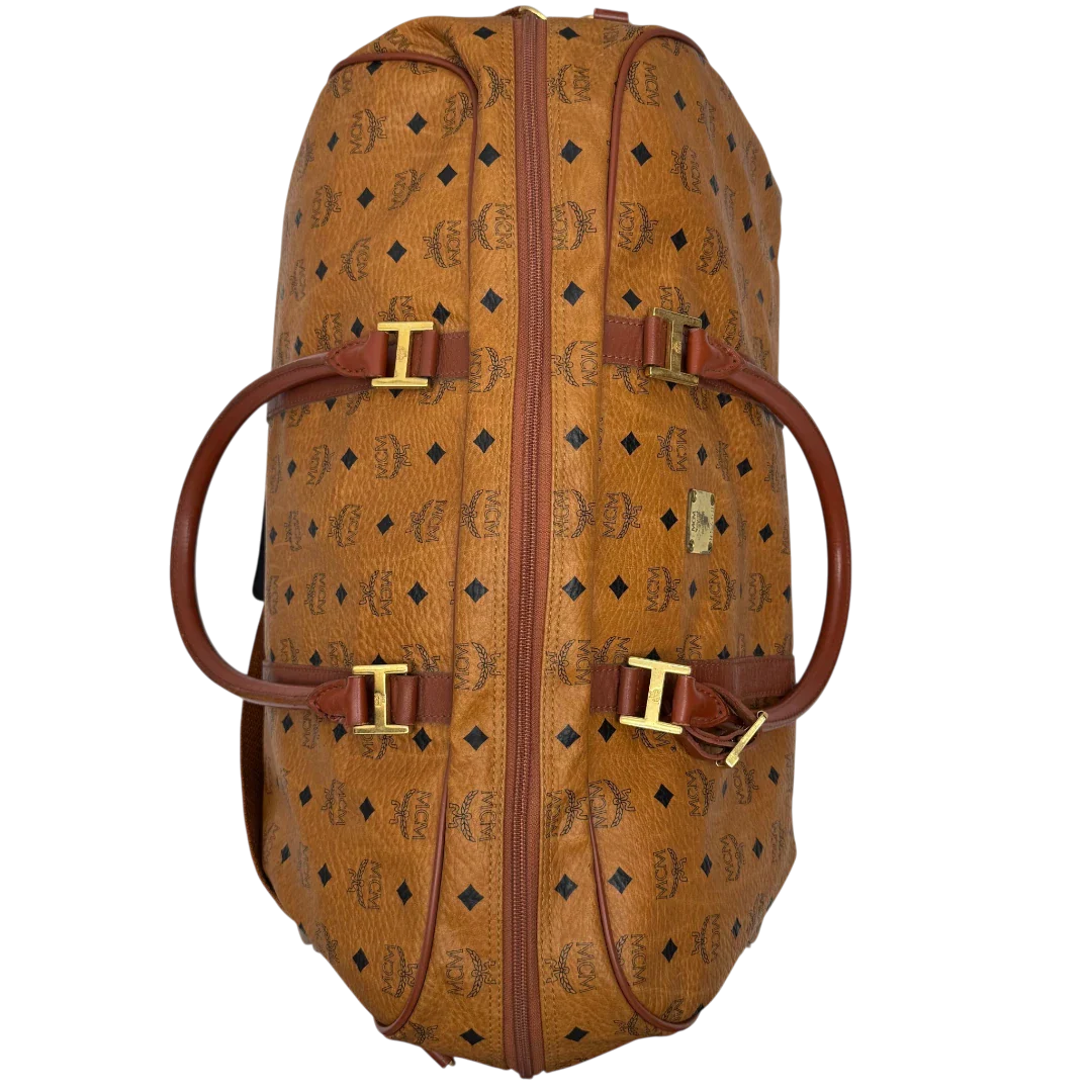 https://cdn.shopify.com/s/files/1/0564/9376/8855/files/MCM_Reisetasche_55_vintage_mit_Schultergurt_visetos_braun_28.webp?v=1784125617