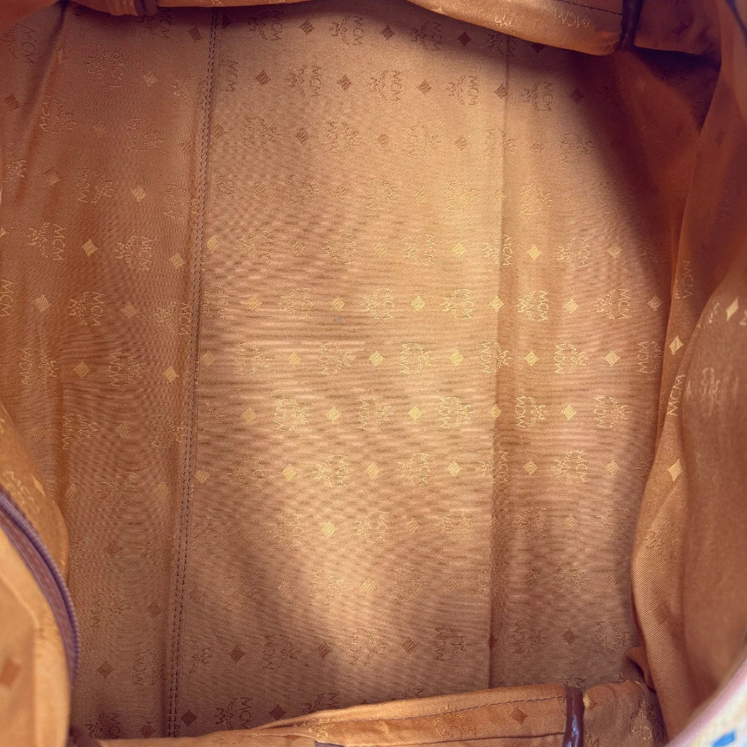 https://cdn.shopify.com/s/files/1/0564/9376/8855/files/MCM_Reisetasche_55_vintage_mit_Schultergurt_visetos_braun_29.webp?v=1784125618