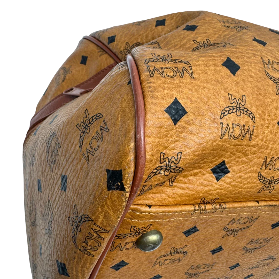 https://cdn.shopify.com/s/files/1/0564/9376/8855/files/MCM_Reisetasche_55_vintage_mit_Schultergurt_visetos_braun_6.webp?v=1784125618