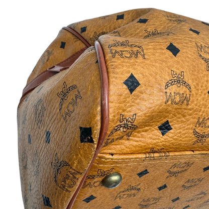 https://cdn.shopify.com/s/files/1/0564/9376/8855/files/MCM_Reisetasche_55_vintage_mit_Schultergurt_visetos_braun_6.webp?v=1784125618