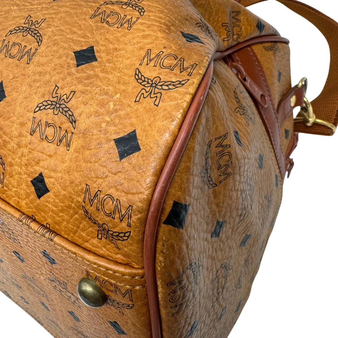 https://cdn.shopify.com/s/files/1/0564/9376/8855/files/MCM_Reisetasche_55_vintage_mit_Schultergurt_visetos_braun_7.webp?v=1784125617
