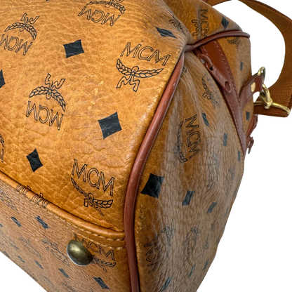 https://cdn.shopify.com/s/files/1/0564/9376/8855/files/MCM_Reisetasche_55_vintage_mit_Schultergurt_visetos_braun_7.webp?v=1784125617
