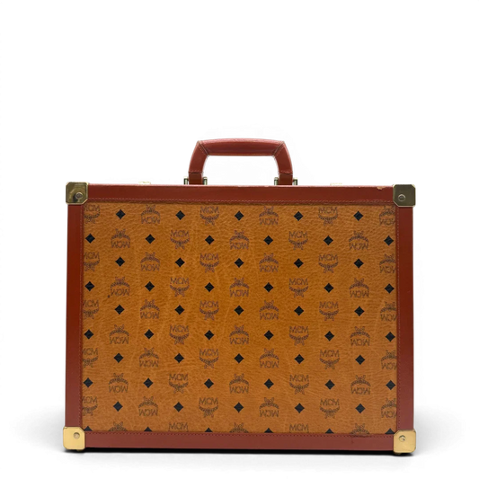 https://cdn.shopify.com/s/files/1/0564/9376/8855/files/MCM_Reisetasche_Gross_vintage5652.webp?v=1777465423