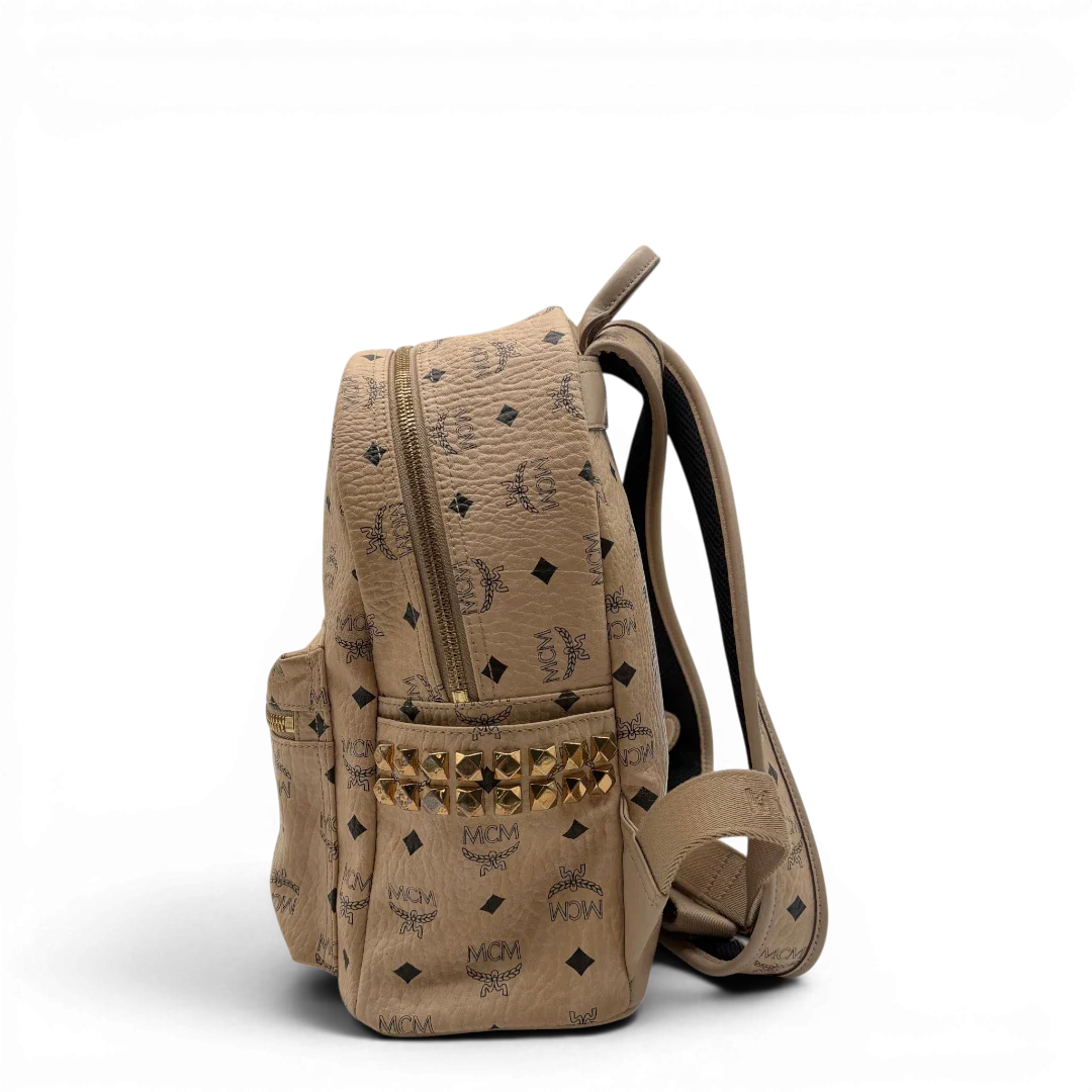 https://cdn.shopify.com/s/files/1/0564/9376/8855/files/MCM_Rucksack_Stark_medium_visetos_beige_vintage8393.webp?v=1781108985